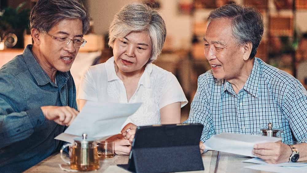 son helping parents with retirement planning