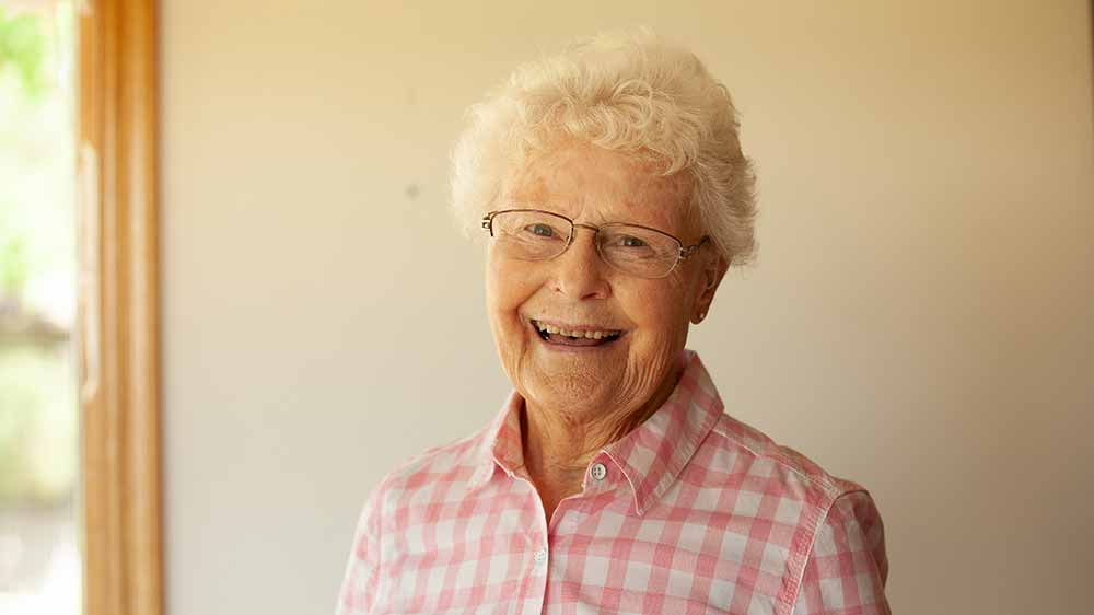 smiling-senior-woman-with-grey-hair