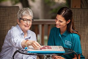 Caregiver Offering Companionship to Senior