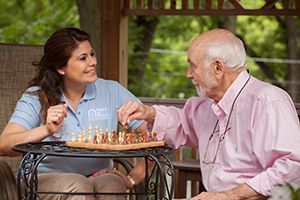 Caregiver Offering Companionship to Senior