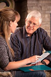 Adult child talking to parent about in-home care