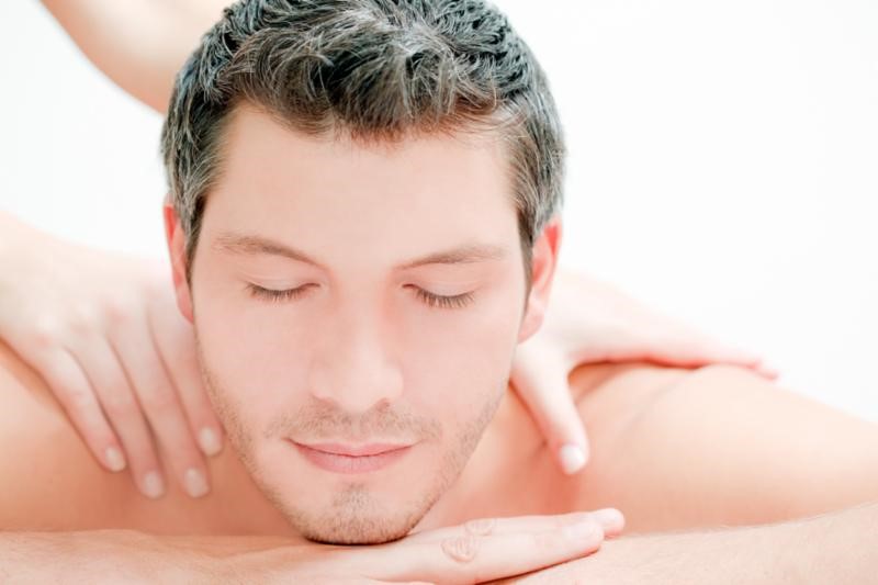 Man receiving a massage on a table