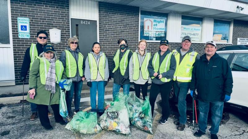 Rotary Club of Skokie group photo with lime green vests on