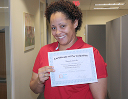 caregiver holding a certificate