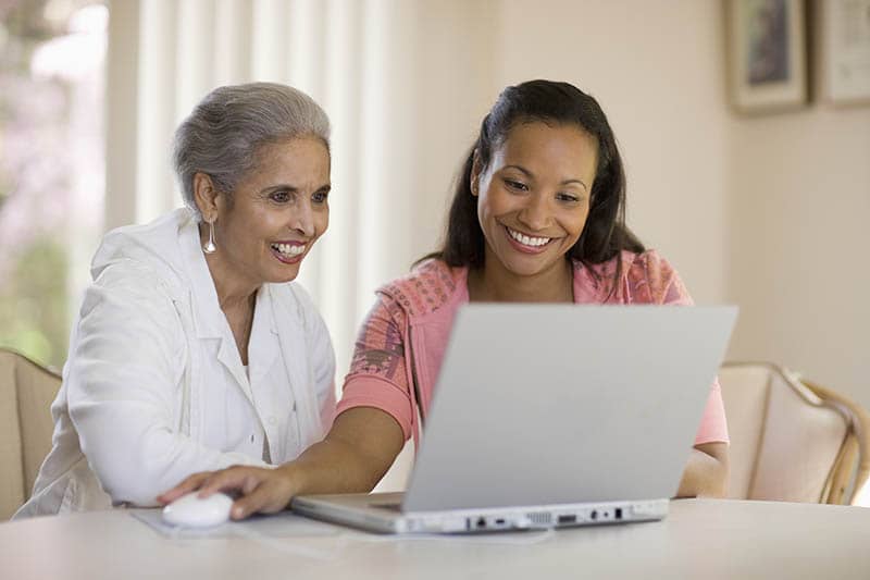 A caregiver who knows what’s trending in senior care uses technology to enrich an older woman’s life.