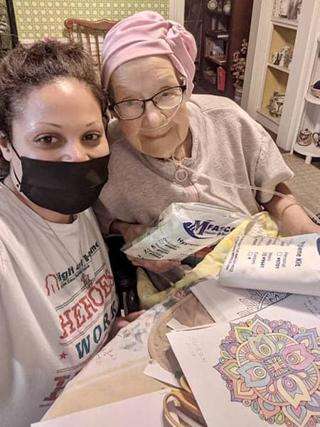 caregiver and senior making care packages