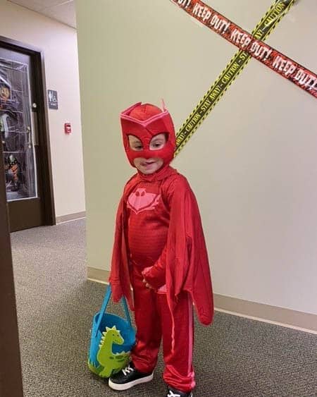 Little super hero trick-or-treating.