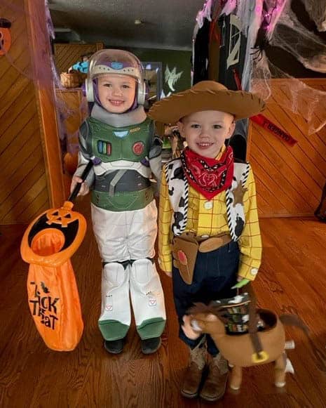 Buzz and Woody trick-or-treating.