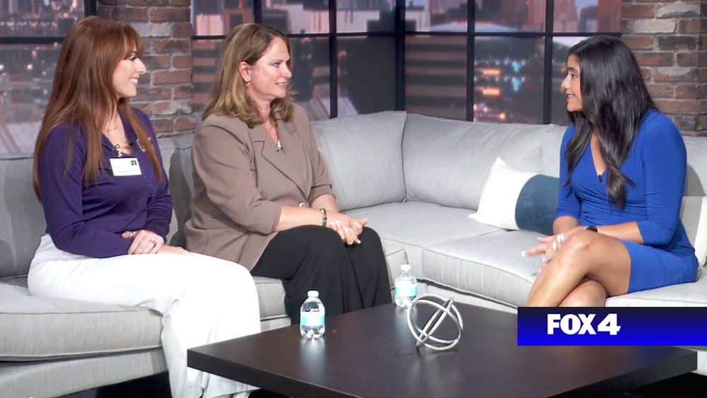 Kami Sjoberg and Kate Willnauer of Right at Home Overland Park sitting on a couch facing a female interviewer from WDAF-Fox Interview