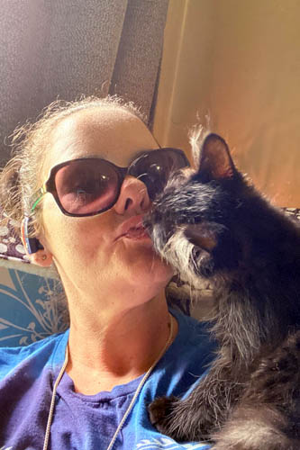 Right at Home Edmond Caregiver Spotlight Head and Shoulder Photo of Caregiver Jaime Farrow and Her Pet Cat