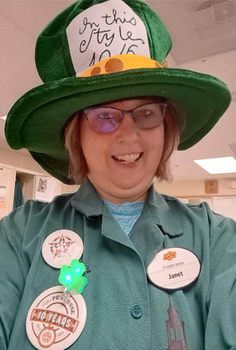 Head and Shoulder Photo of a Woman Dressed Up as a Leprechaun with a Green Hat for St. Patrick's Day