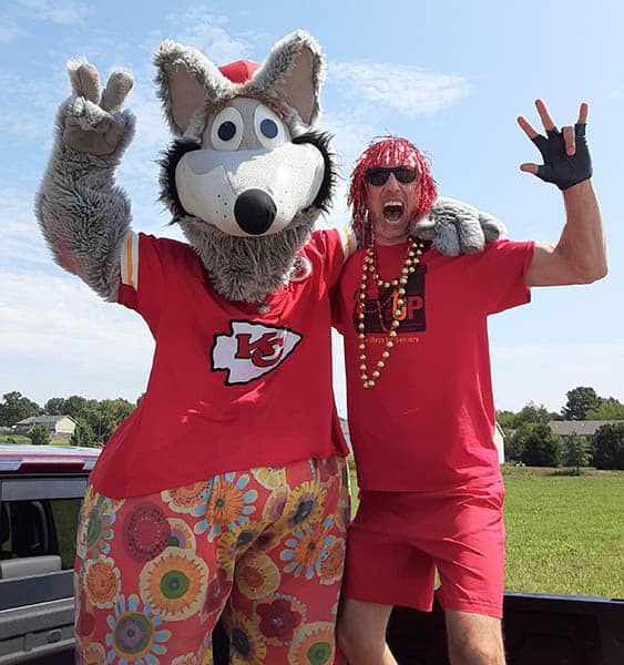 Right at Home staff joined KC Wolf, The Kansas City Chiefs mascot at a local parade