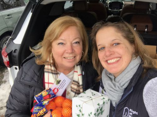 Diane and Cindy, from private care program, delivering gifts to seniors