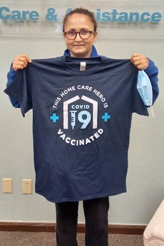 Right at Home Northwest Oklahoma City Caregiver Rewarded with Vaccination T-Shirt