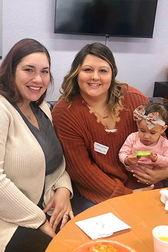 Two caregivers and a daughter during our Halloween caregiver appreciation gathering