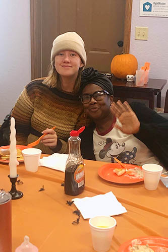 Eating and enjoying company during our Halloween caregiver appreciation gathering