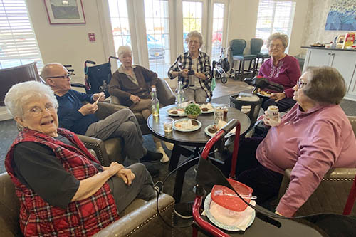 A lively atmosphere was in the air as Friday night happy hour at Hefner Mansion Senior Living