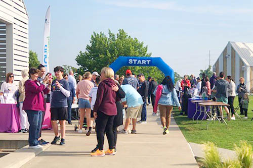 Parkinson Walk 2023 Crowd and Starting Line Arch