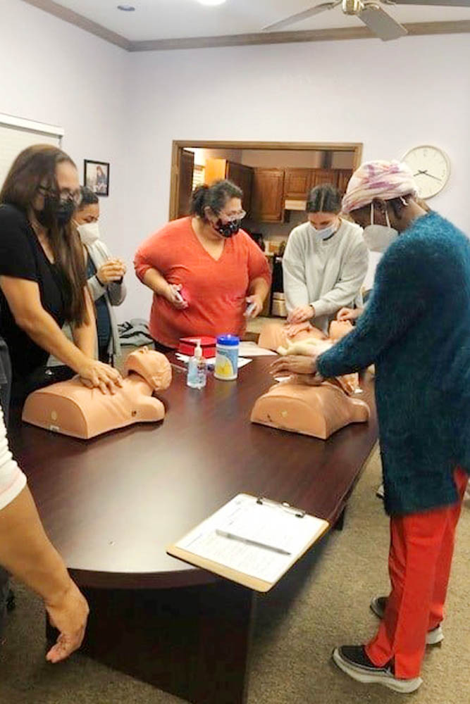 Right at Home Northwest Oklahoma City Care Team Working on CPR Training