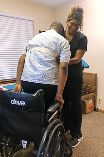 Right at Home Northwest Oklahoma City caregiver training on transferring wheelchair clients