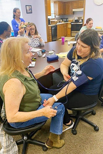Right at Home Northwest Oklahoma City caregivers training to check vital signs