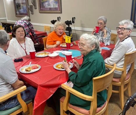 SW Mansions Cook Out-Seniors Enjoying Their Meal