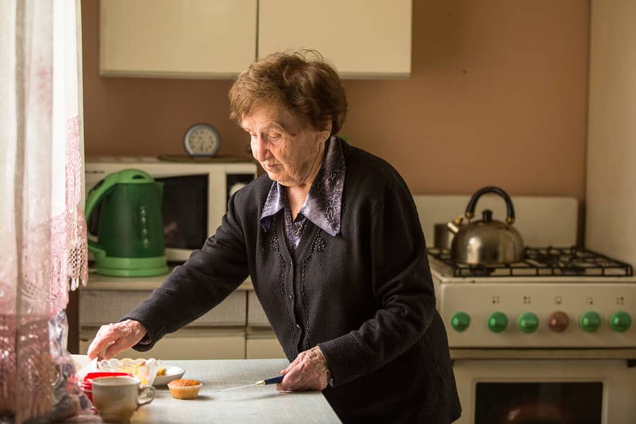 senior woman in kitchen