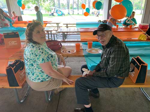 Caregiver and client at picnic