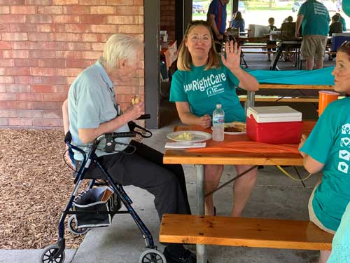 Client and Caregivers at picnic