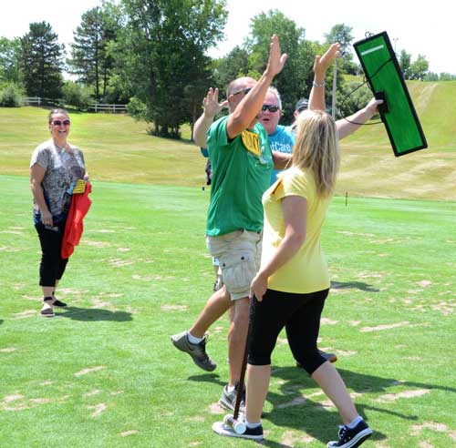 High Five on Golf Course