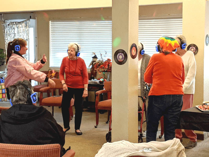 people dancing during Silent Disco at Deer Park Retirement Community