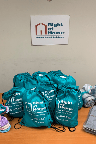 Christmas Bags for Caregivers with Right at Home logo