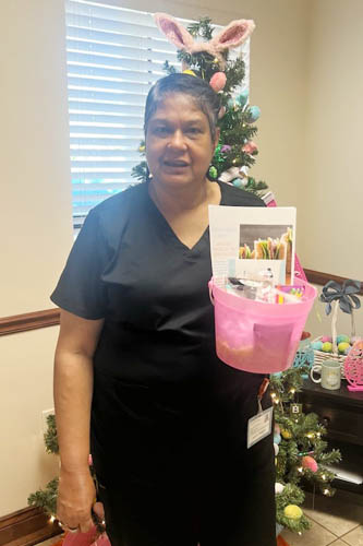 Caregivers with Right at Home Slidell receive appreciation baskets of goodies to celebrate the Easter holiday season