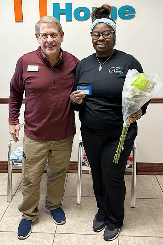 Right at Home Slidell Owner Harry Spring Celebrating Caregiver Aneshua Richards Fourth Work Anniversary