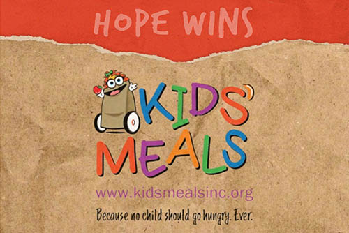 Kids Meals Juice Box Challenge label with the logo on a paper sack background