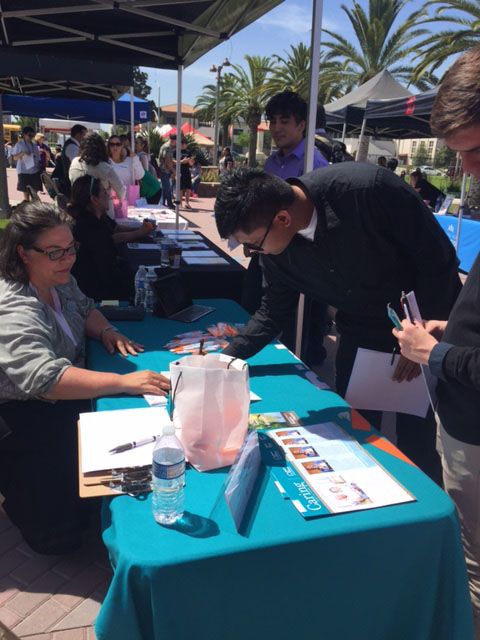 Tricia and Kylene at the Career Health Fair at Long Beach City College with students.