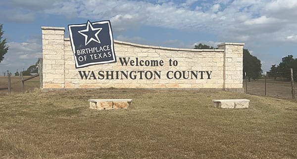 The Welcome to Washington County sign in Brenham, TX