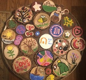 Wood Rounds Art Project with Seniors at Fieldstone Assisted Living