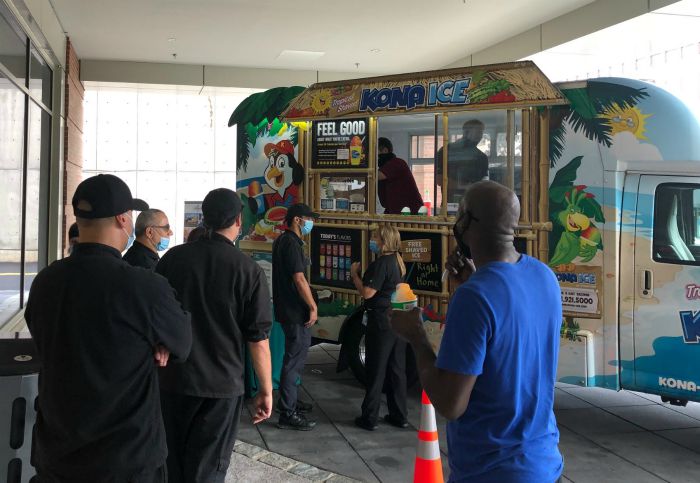 Healthcare Heroes from Epic Rehabilitation and Nursing lined up for a free Kona Ice from Right at Home Westchester