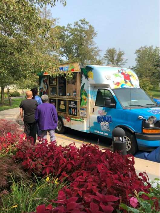 healthcare heroes lined up at the kona ice truck at The Grove at Valhalla Rehabilitation and Nursing, Valhalla, NY.  Event sponsored by Right at Home Westchester