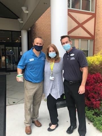 Right at Home of Westchester Owner, Lou Giampa with two other people at The Grove at Valhalla Rehabilitation and Nursing, Valhalla, NY.