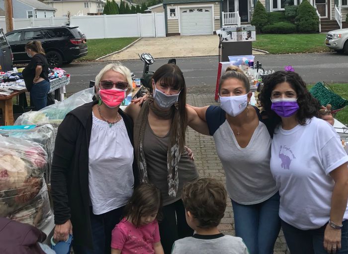 Right at Home South Shore Long Island Owner Jeanine Gagliano and 3 female friends and two children at the ADRC Fundraiser Yard sale for their virtual walk to end Alzheimer's.