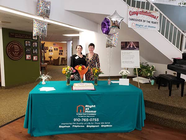 two people at office caregiver of the year celebration