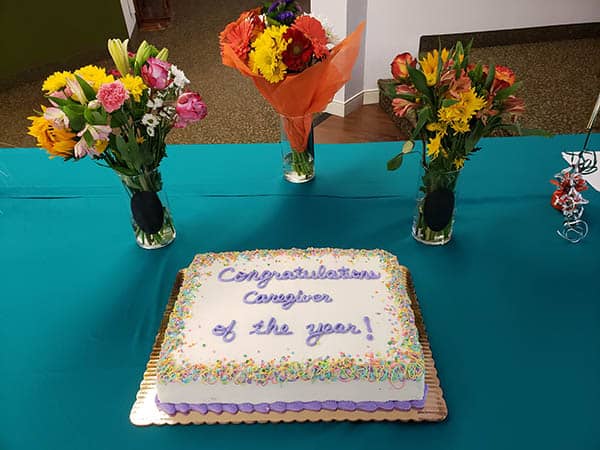 cake at office caregiver of the year celebration