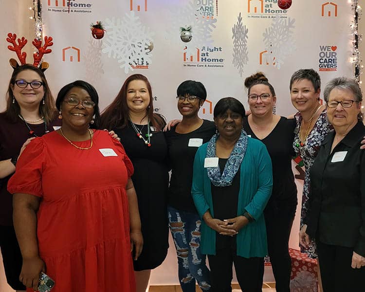 caregivers and staff at the 2022 holiday party 