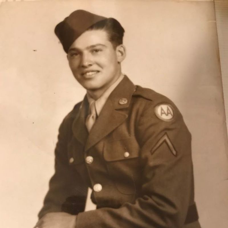 sepia photo of white male in military uniform