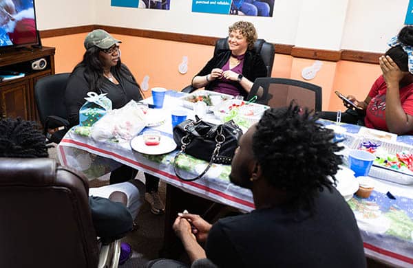 people sitting around a conference table