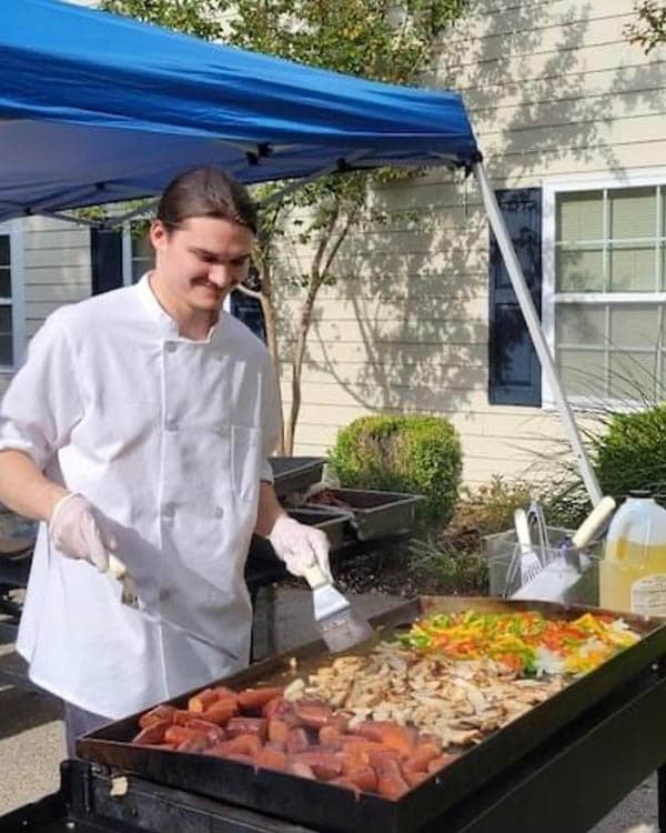 The Hearth chef prepares dinner