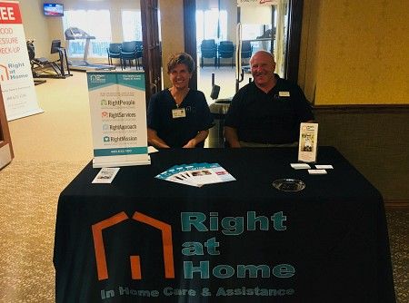 Owner Mark Leuer and Selena from Right at Home East Valley Phoenix at the Copper Springs Grand Opening in Gilbert, Arizona 