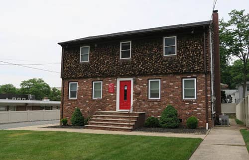 Before renovation of right at home of essex county office building outside